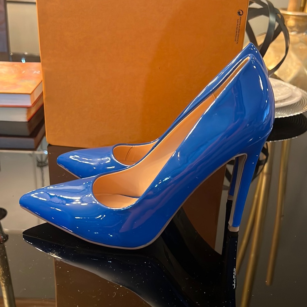 Blue patent looking heels. Bought these in Aruba when my luggage was lost.